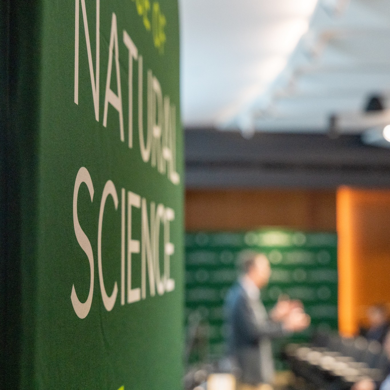 A clos-up shot of a college of natural science banner.